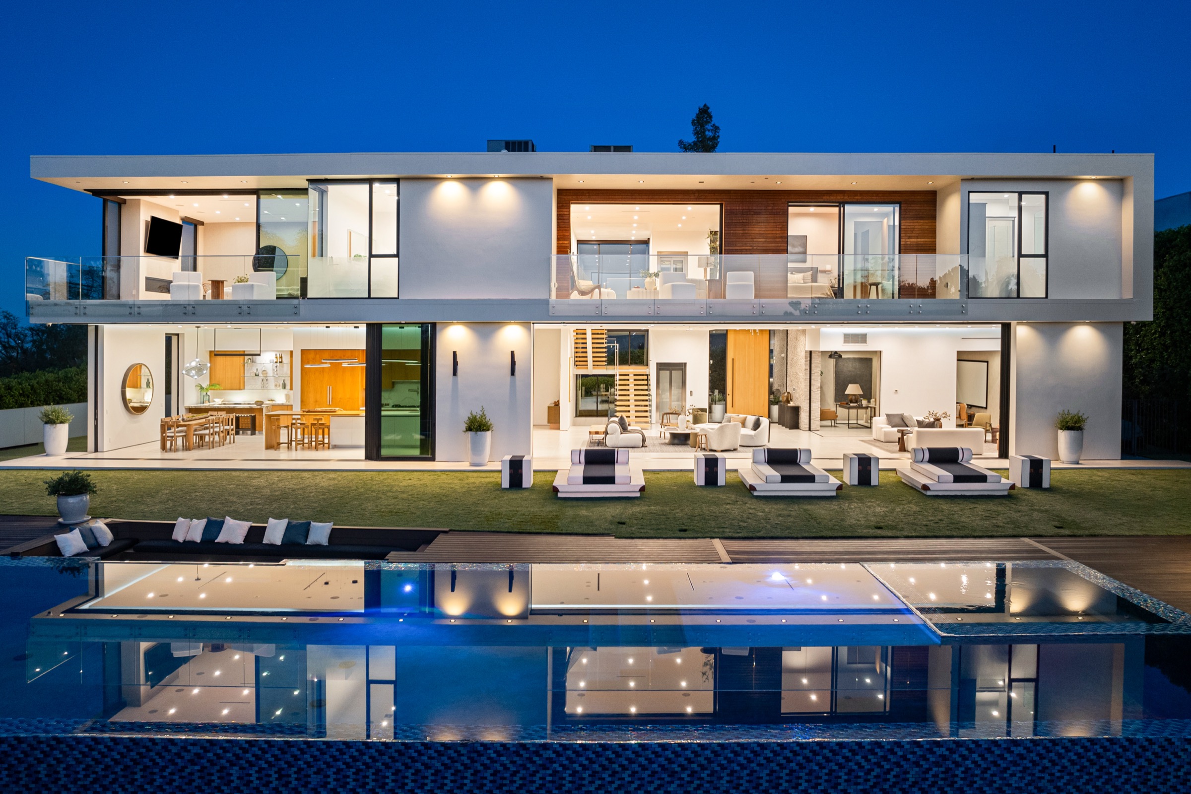 Contemporary villa illuminated at dusk