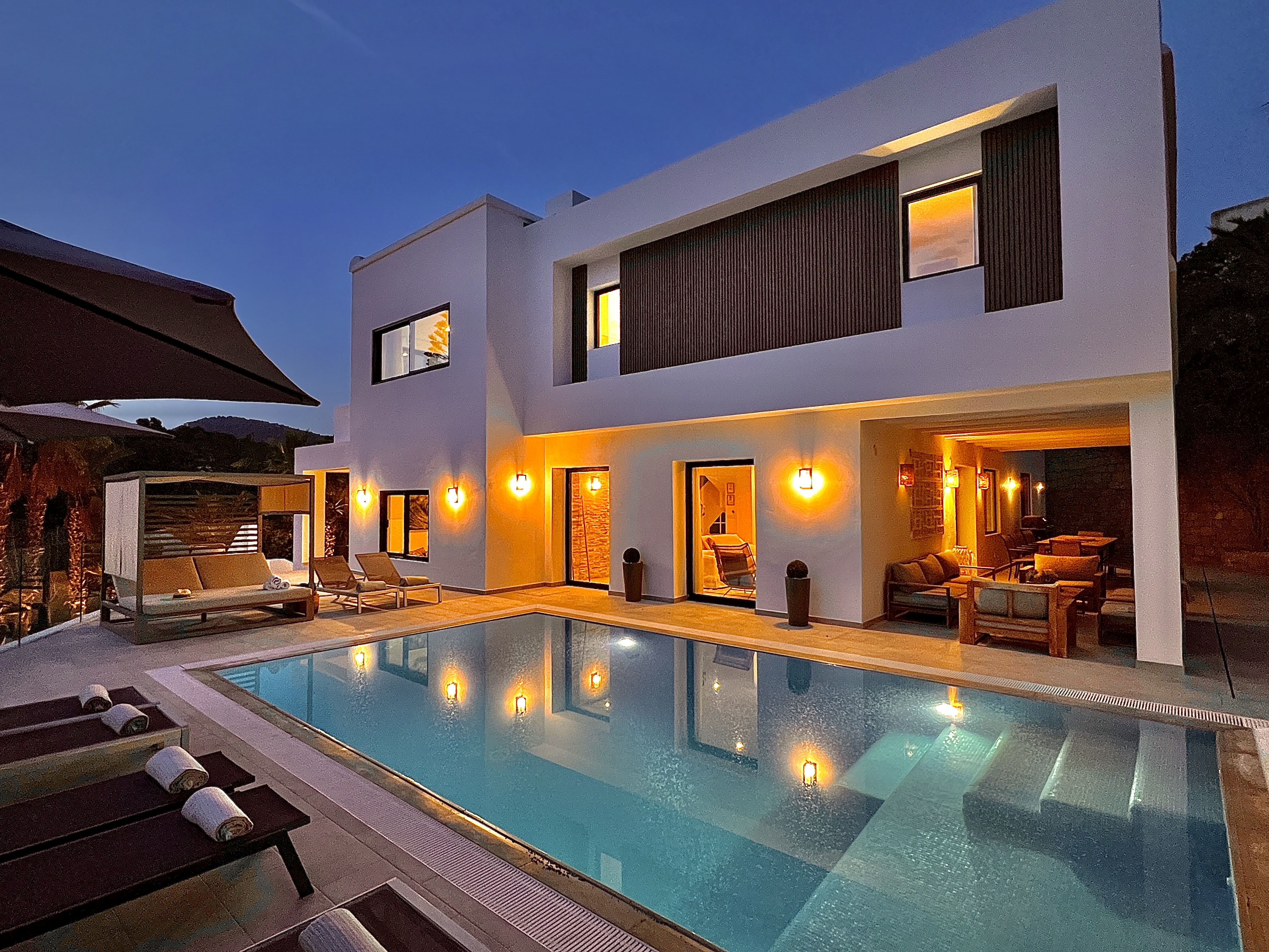 Luxury villa pool at twilight
